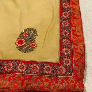Indian Ethnic Saree, beige color with bright red border with bright embroidery